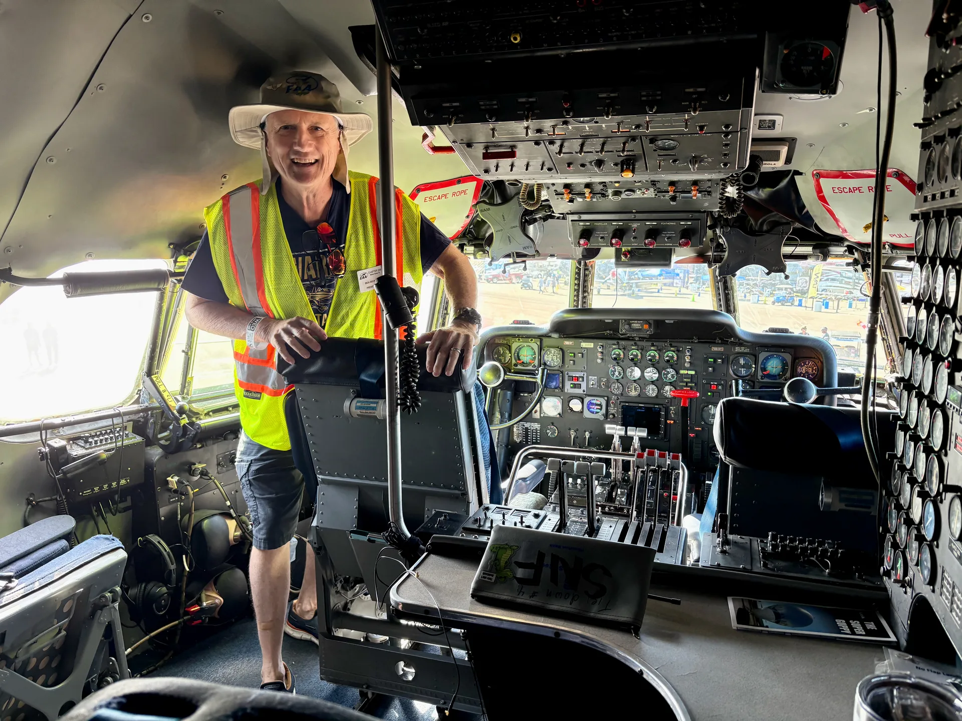 EAA Chapter 229 volunteer inside the cockpit of the NASA Super Guppy Turbine at Sun n Fun 2026