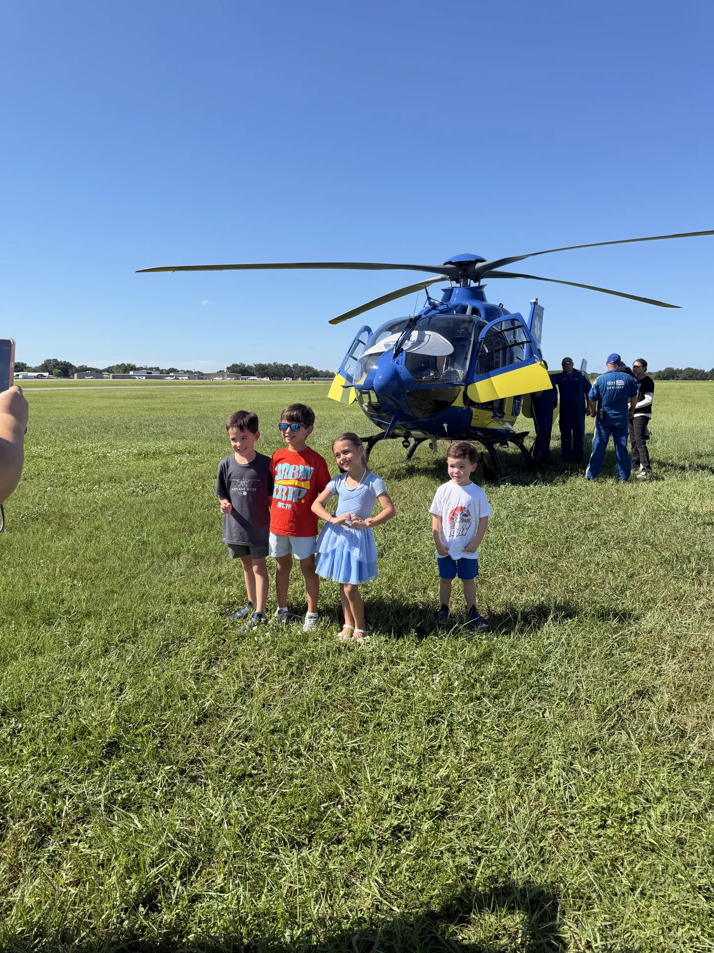 Kids get an up-close look at a static-display aircraft on the ramp